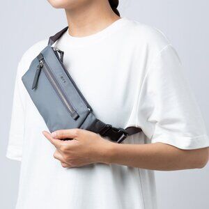 New TUMI Meera Gray Body Wallet Slim Waist Pack $125 Travel Safety